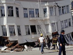 old white apartment building collapsed