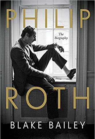 Novelist Roth sits at a window